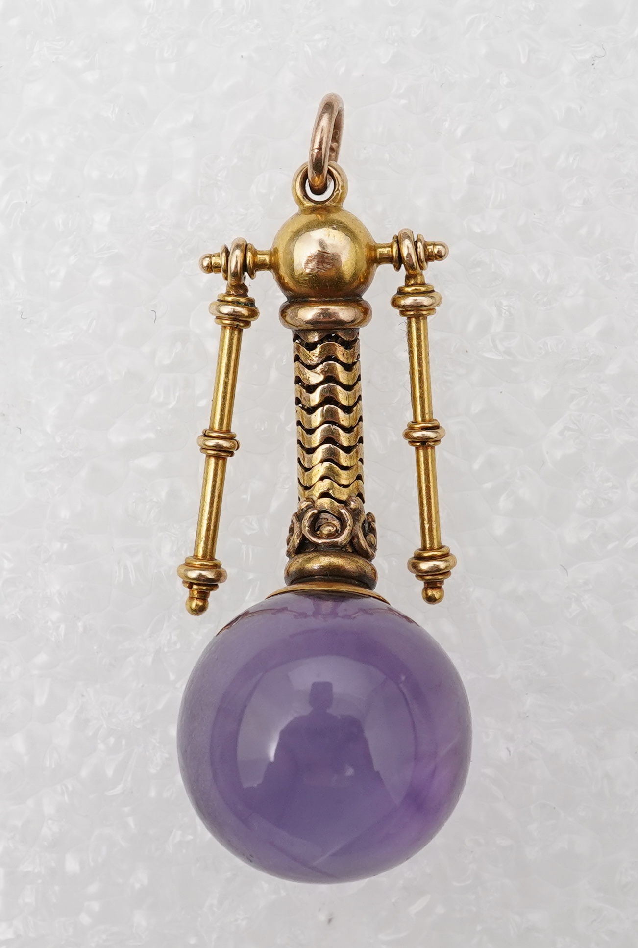 An unusual Victorian gold and amethyst pendant, mid 19th century